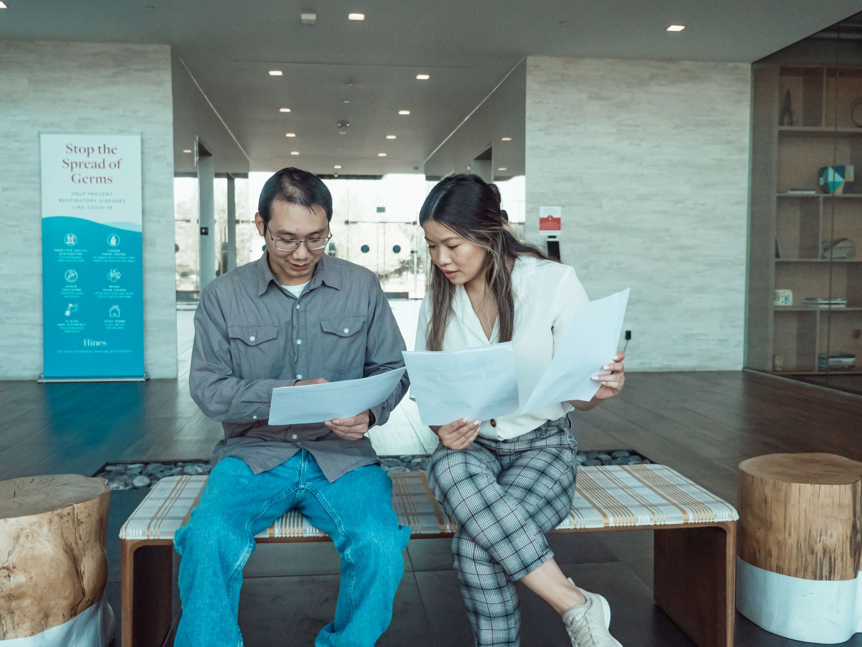A student reviewing their health insurance claim paperwork